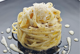 cacio e pepe pasta served on plate