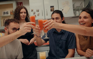 cheers with bellini cocktail