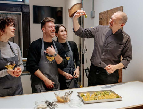 chef judging tortelli in team building