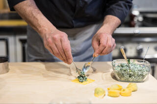 Chef makes hand made tortelli pastas