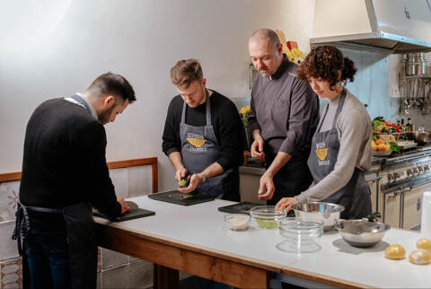 chef with students in mama florence class