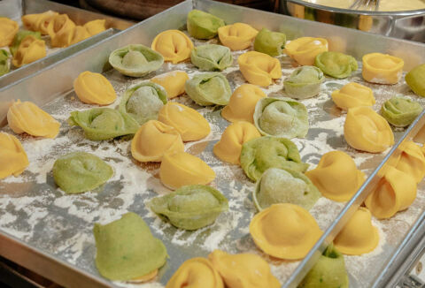 fresh colored pasta displayed ready to cook