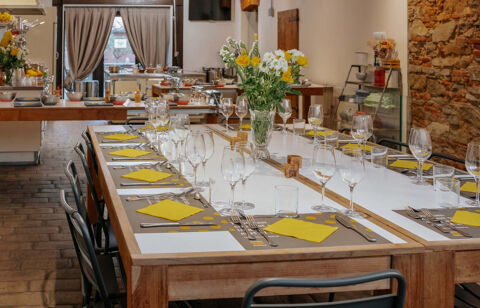cooking school ready for cooking class with set dining table