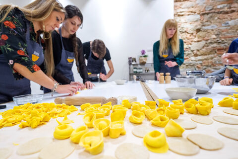 group of students making tortelli