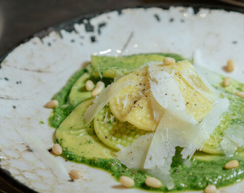 corzetti pasta with pesto and parmesan