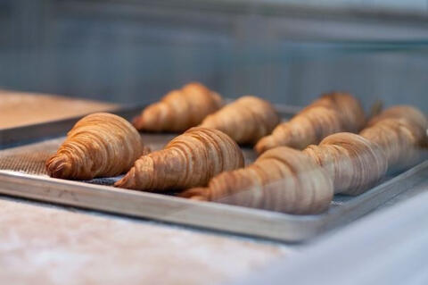 croissants on steel tray