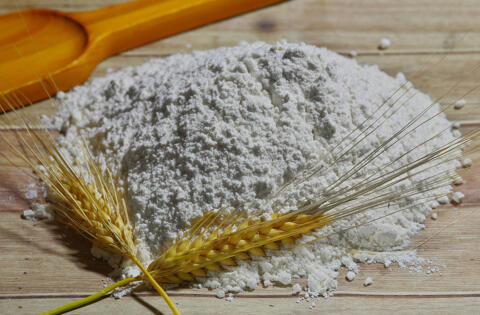 flour on wooden table