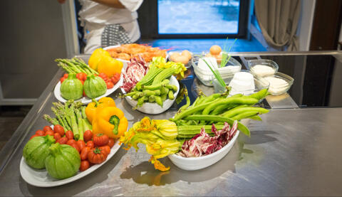 selection of fresh vegetables in cooking class kitchen
