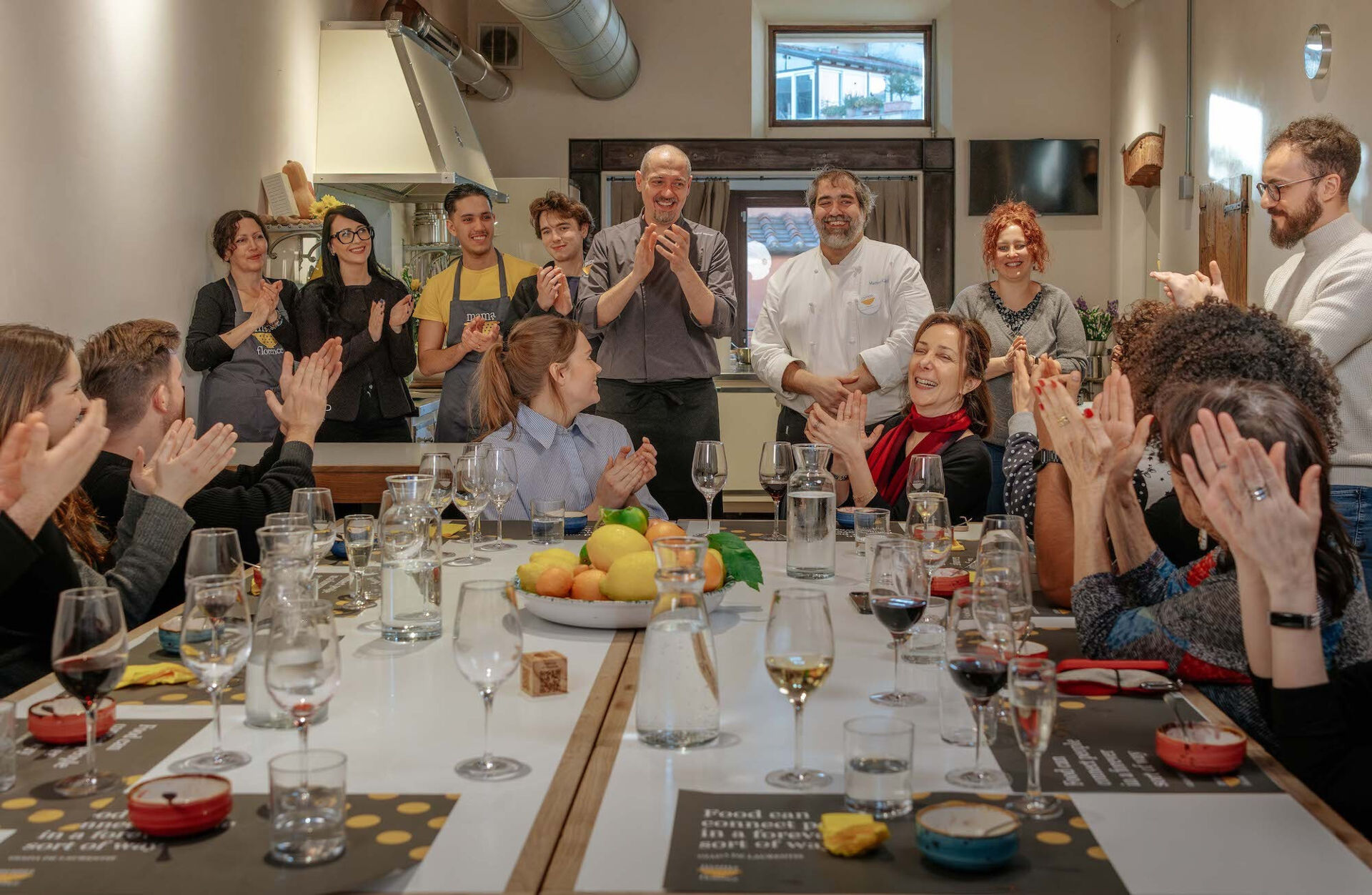 group applause at cooking class