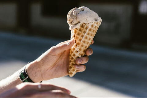 ice cream cone in hand