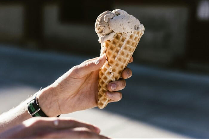 ice cream cone in hand