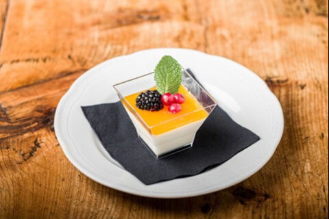 small panna cotta with fruit coulis.