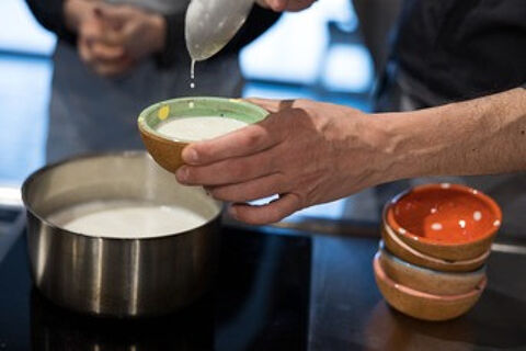 panna cotta being served into bowls