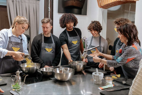group of people participating in cooking class