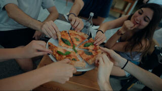 group sharing pizza