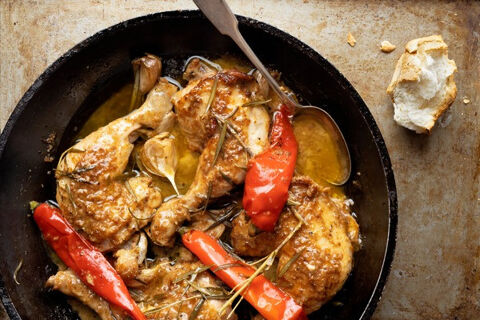 stewed chicken dish with red peppers and rosemary