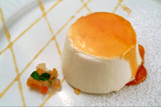 panna cotta with ginger sauce and candied ginger