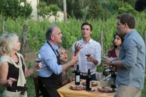 people speaking animatedly about wine