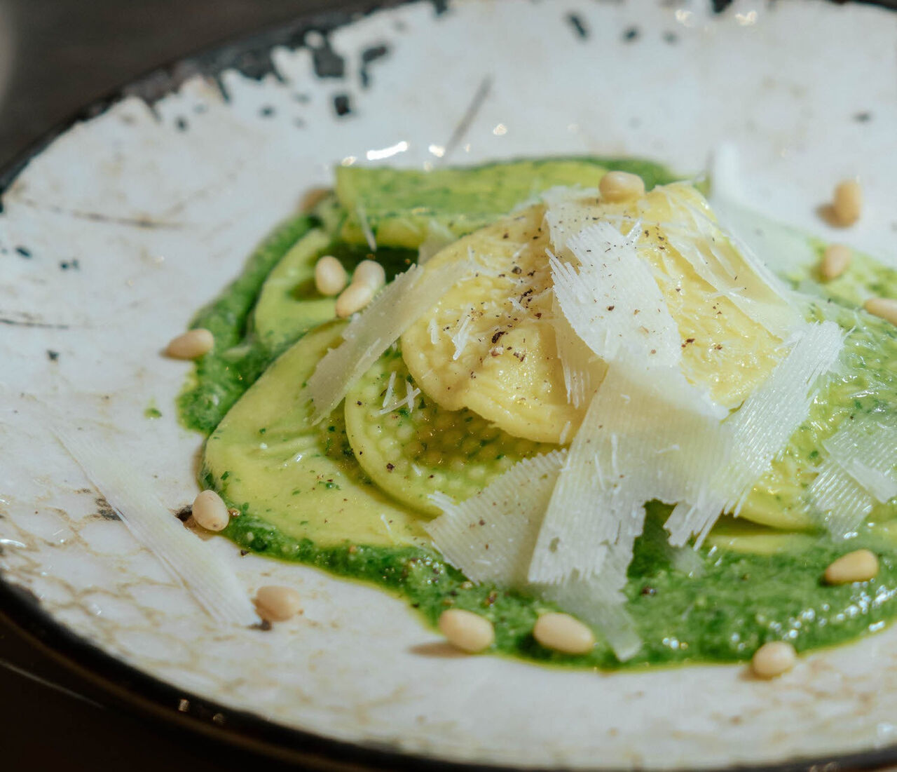 pesto corzetti on dish