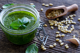 fresh pesto in glass jar with pine nuts