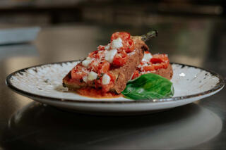 eggplant dish with mozzarella and tomato.
