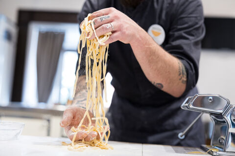 chef making fresh tagliatelle