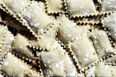 raw ravioli close up dusted in flour