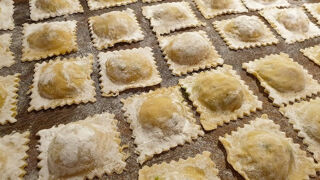 raw gluten free ravioli dusted with flour