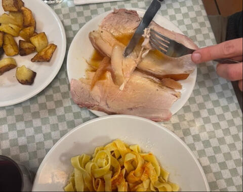 lunch table with meat potato and pasta