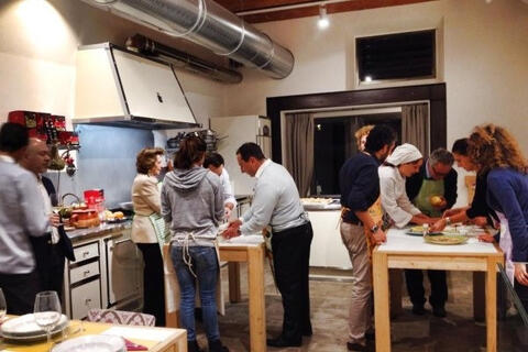group of people participating in cooking class