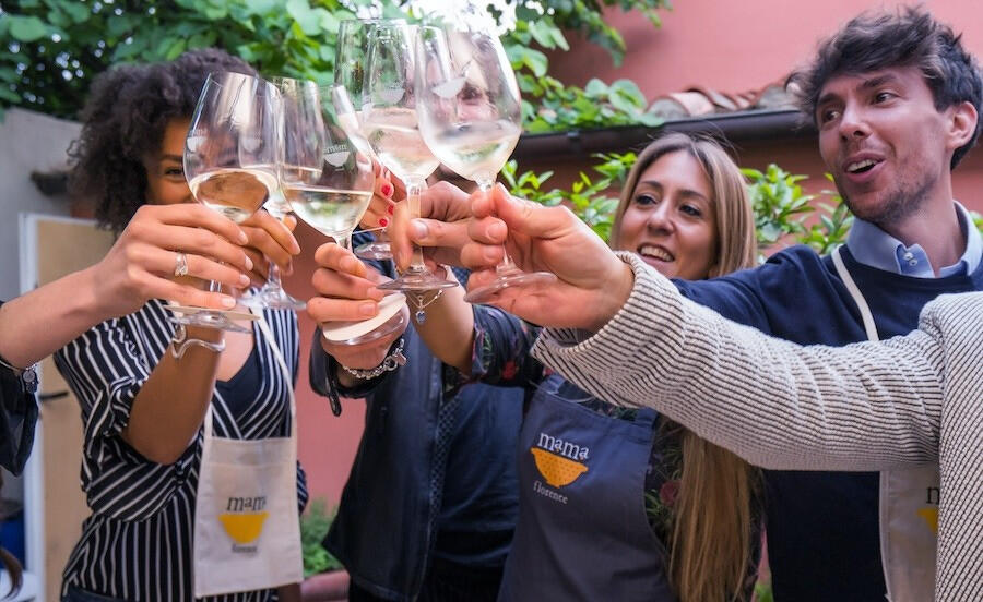 Group cheers with white wine