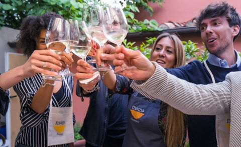 Group cheers with white wine