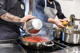 Chef and student cooking in Tuscan cooking class