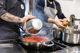 Chef and student cooking in Tuscan cooking class